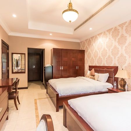 Yanjoon Holiday Homes - Palm Jumeirah Frond A Villas Дубай Екстериор снимка