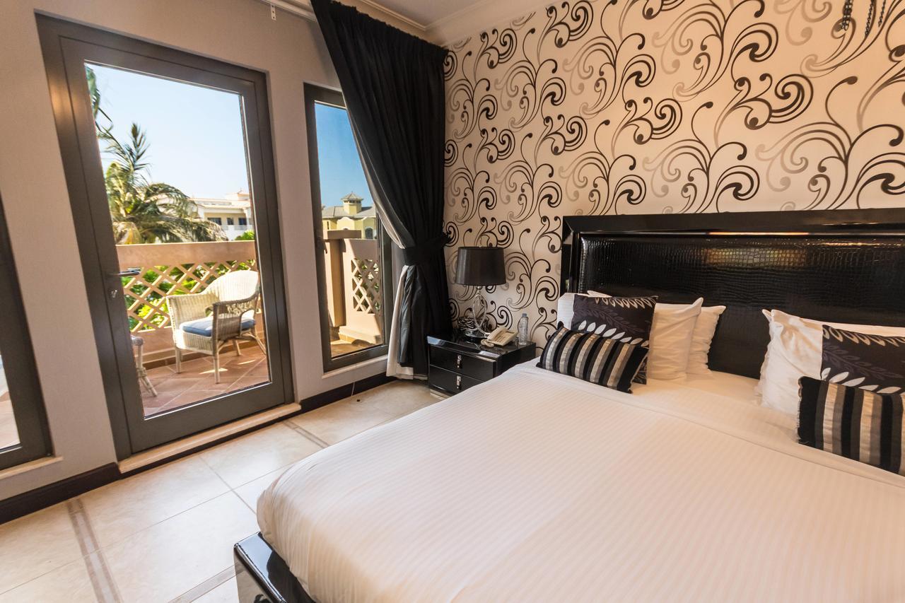 Yanjoon Holiday Homes - Palm Jumeirah Frond A Villas Дубай Екстериор снимка